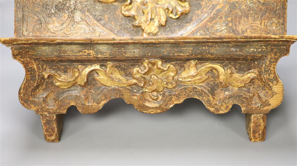 An 18th century Spanish carved and gilded book stand, width 42cm height 37cm